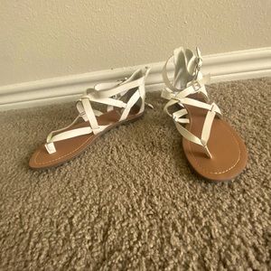 White cross cross flat sandals!